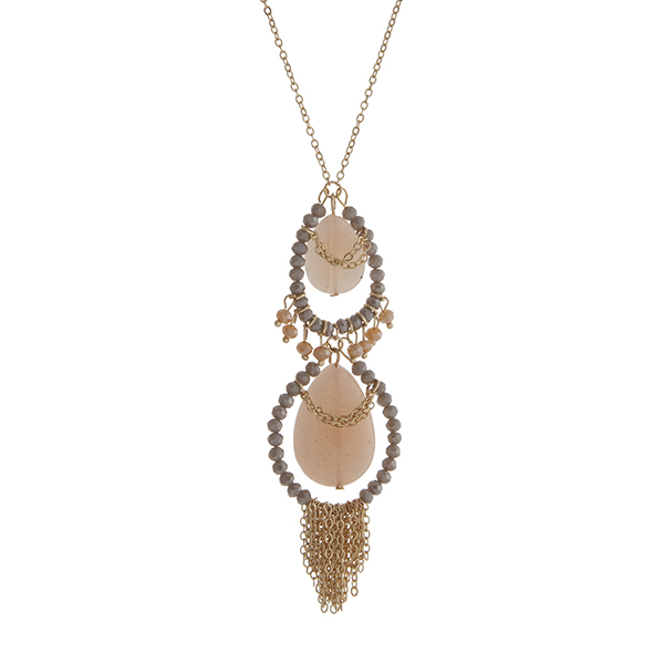 Wholesale gold necklace displaying two peach teardrop stones gray beads chain fr