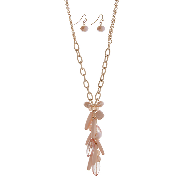 Wholesale gold double strand necklace set displaying long cluster pink beads