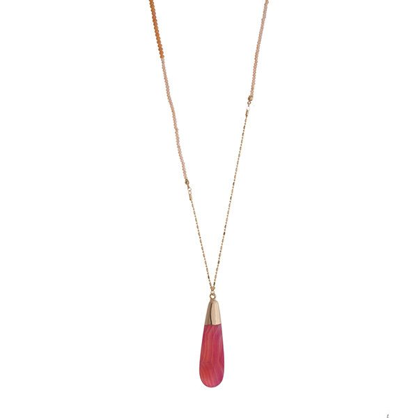 Wholesale gold necklace displaying purple orange pink beads orange teardrop nat