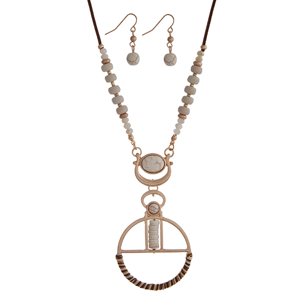 Wholesale brown cord necklace set displaying ivory beads round gold pendant wrap