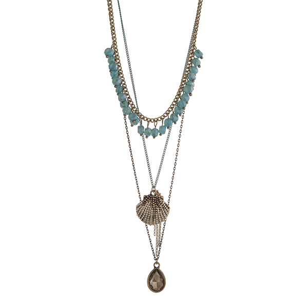 Wholesale gold layering necklace displaying turquoise dangling beads seashell ch
