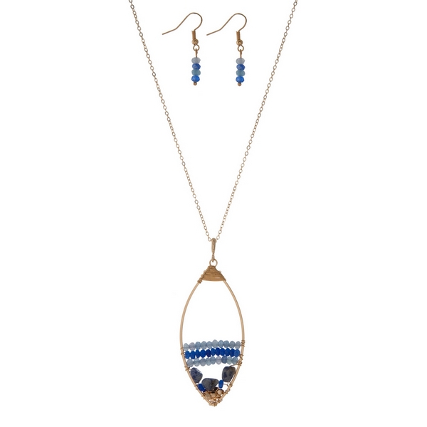 Wholesale gold necklace set displaying open teardrop wire wrapped blue beads