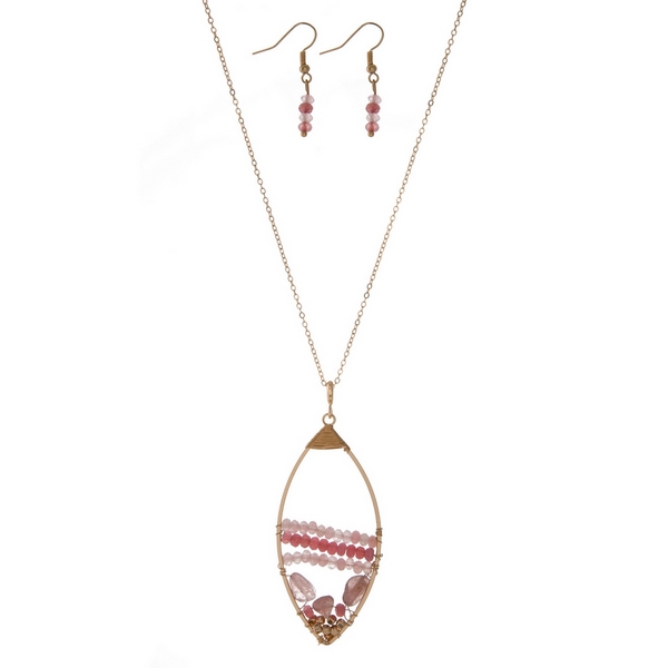 Wholesale gold necklace set displaying open teardrop wire wrapped pink beads