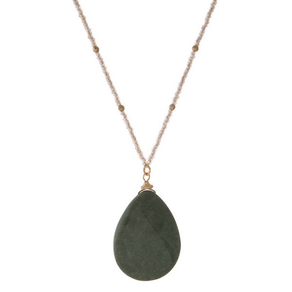 Wholesale blush pink beaded necklace displaying sage green natural stone pendant
