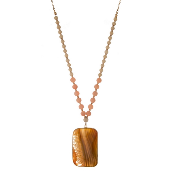Wholesale gold necklace displaying tan wooden beads peach beads gray peach natur
