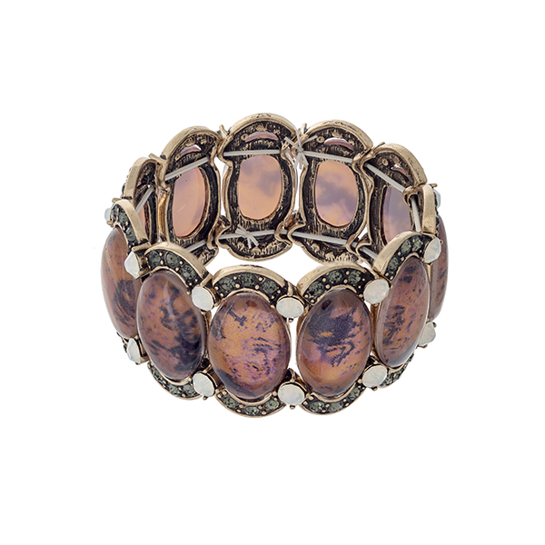 Wholesale burnished gold stretch bracelet displaying orange oval stones black di